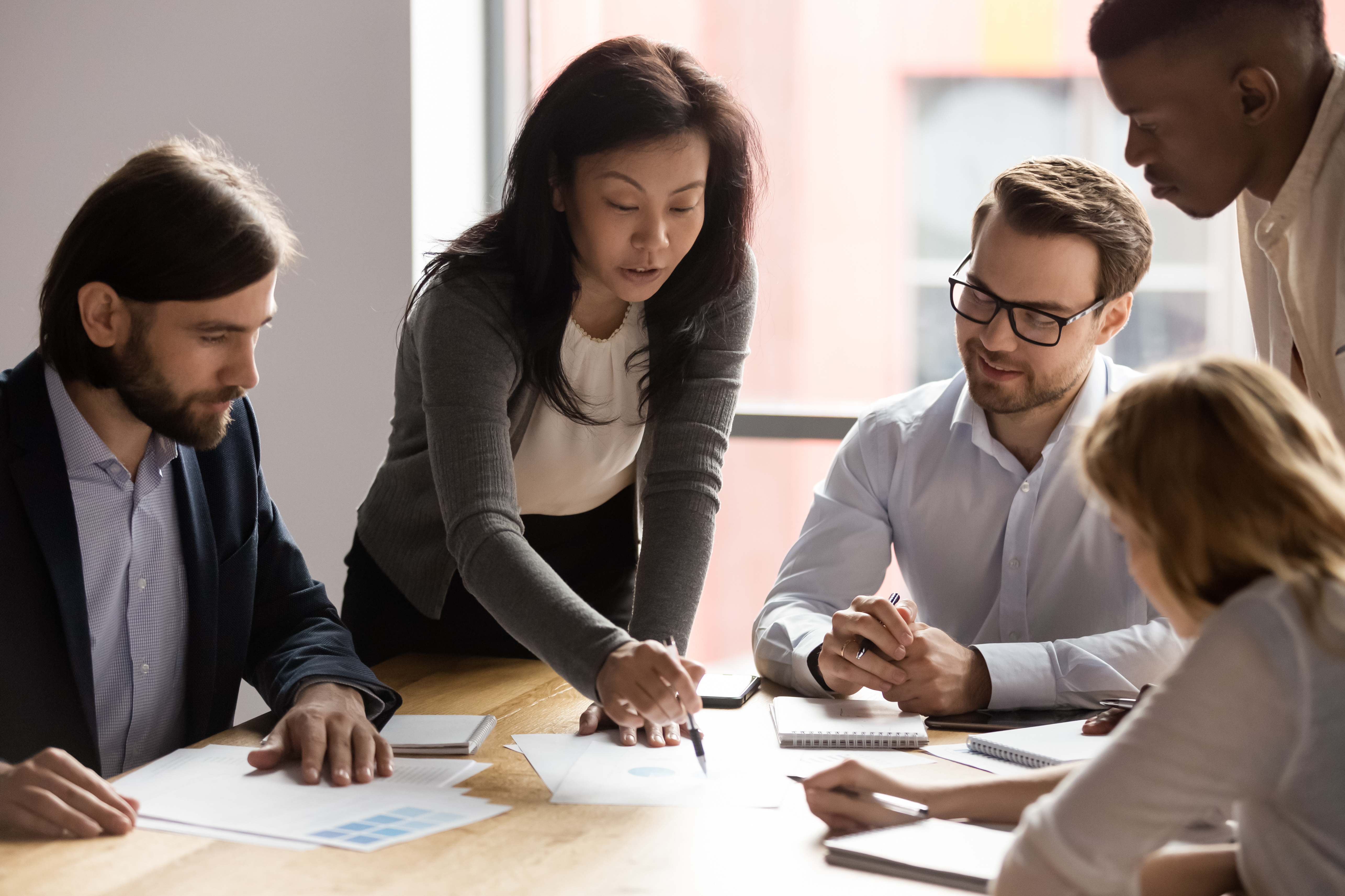 Diverse Group of 5 Meeting in Conference Room  Landscape  01